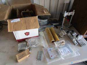 lot 103 image: Large box of assorted staples, NEW corner braces, paint rollers, chairs and more