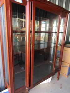 lot 120 image: Antique rolling display cabinet front glass 3 tier wooden shelving 63x49x19, Original metal castor wheels