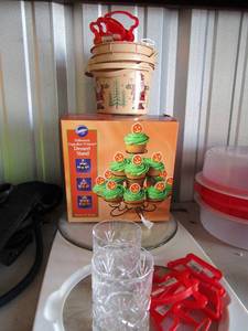 lot 124 image: 2 diamond cut crystal glasses, NEW 13 count cupcake stands x 2,  NEW cookie cutters, white cutting board