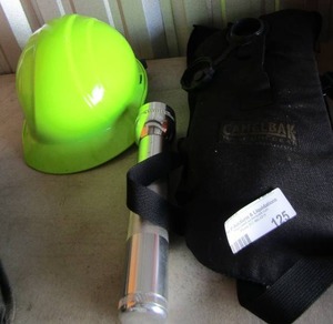 lot 125 image: NEW neon green hard hat, CamelBak water pouch silver flashlight