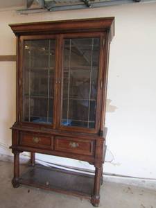 lot 18 image: SILVER APPLE China hutch 2 pieces bottom has 2 drawers top has glass front 2 doors