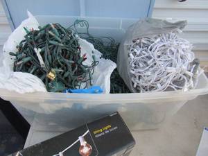 lot 24 image: Tote full of holiday lights app. 8 strands 1 box string lights
