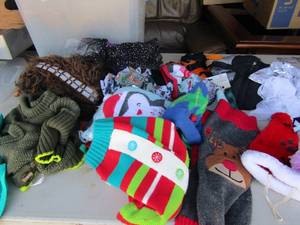 lot 49 image: Small tub of  dog clothes and costumes leaches size small-medium