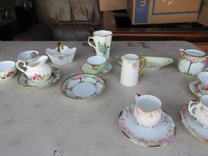 lot 52 image: Nippon and Bavarian china pieces  teacups, plates sugar and creamer