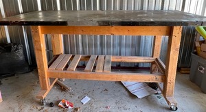 lot 152 image: WORKBENCH ON ROLLERS - HAS SHELF & RACK ON END - 83L X 36W X 40H