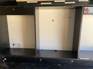 lot 176 image: BACK  COUNTER  BLACK   HAS SHELVES  26H X 84L X 18D