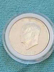 lot 12 image: 1972 S - Eisenhower Dollar in capsule storage case