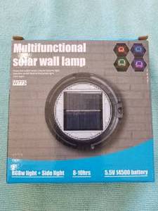 lot 119 image: Multifunctional Solar Wall Lamp - new in box