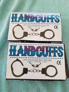 lot 113 image: Selection of Handcuffs (2) - new in box