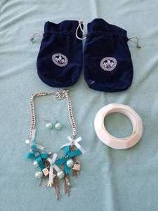 lot 212 image: Necklace and bracelet in velvet pouches - new