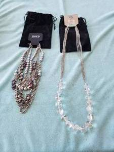 lot 242 image: Selection of 2 necklaces with their own pouch - new