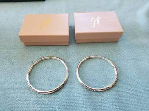 lot 233 image: Pair of John Wanamaker - JW Bracelets - new in box