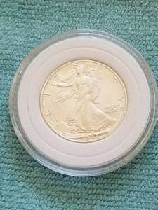 lot 43 image: 1943-D WALKING LIBERTY HALF DOLLAR COIN in capsule storage case - uncirculated