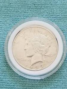 lot 55 image: Peace Silver Dollar in capsule case - 1935