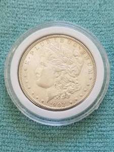 lot 70 image: Morgan Silver Dollar in capsule storage case - 1902-O