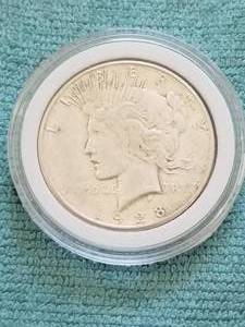 lot 82 image: Peace Silver Dollar in capsule case - 1928S