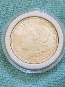 lot 132 image: 1921 Morgan Silver Dollar in capsule storage case