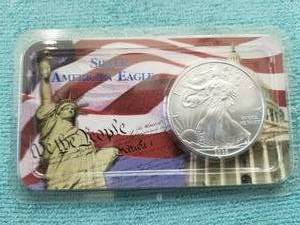 lot 341 image: American Eagle Silver dollar - uncirculated condition - 2009