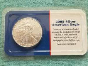 lot 359 image: American Eagle Silver dollar - uncirculated condition - 2003