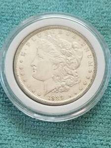 lot 368 image: Morgan Silver Dollar in capsule storage case - 1889