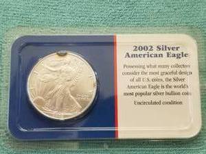 lot 369 image: American Eagle Silver dollar - uncirculated condition - 2002