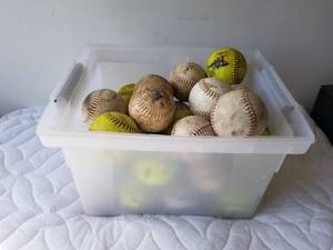 lot 377 image: Bin of softballs