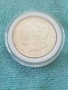 lot 129 image: Morgan Silver Dollar in capsule storage case - 1921