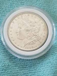 lot 170 image: Morgan Silver Dollar in capsule storage case - 1896