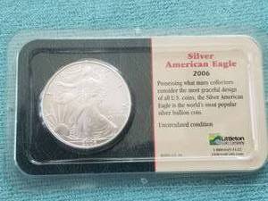 lot 405 image: American Eagle Silver dollar - uncirculated condition - 2006