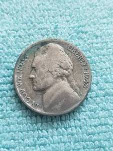 lot 412 image: Jefferson Silver Nickel - 1942-1945 - World War II Emergency Silver Coin - 1943 - with COA