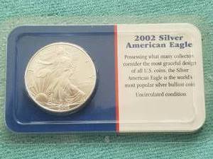 lot 421 image: American Eagle Silver dollar - uncirculated condition - 2002