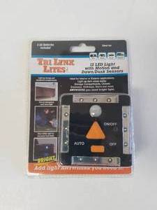 lot 439 image: LYNX 12-LED LIGHT WITH MOTION AND DAWNDUSK SENSORS  BLACK- #00027B - Total of 4