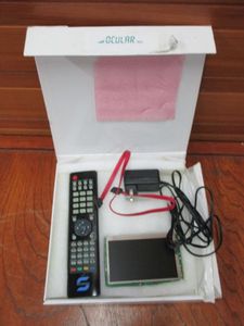 lot 38 image: TOUCHSCREEN W REMOTE, BOX LABELED OCULAR INC.