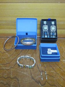 lot 49 image: QUALITY FASHION JEWELRY, 3 DIFFERENT BRACELETS, 2 SETS OF DANGLE EARRINGS &amp A SLIDE LABELED SS 11.36 CTW B LUCE ECRD DIA SIM SLIDE