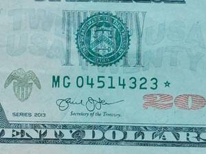 lot 13 image: $20 STAR NOTE WITH SERIAL #MG 04514323