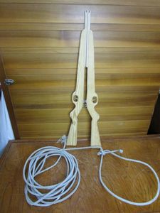lot 80 image: 2 RUBBERBAND RIFLES W 1 BAG OF AMMO (RUBBERBANDS), 1 LASSO