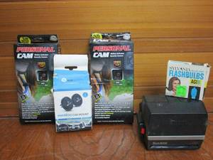lot 82 image: VINTAGE SUN 600 LMS POLAROID CAMERA, SYLVANIA BLUE DOT FLASHBULBS AB1B, (2) PERSONAL CAM MOTION ACTIVATED SECURITY CAMERAS NEW IN BOX, MAGNETIC CAR MOUNT OPEN BOX