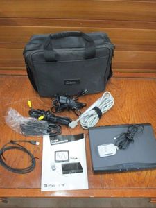 lot 89 image: TEXAS INSTRUMENTS PRESENTER W CARRYING CASE. APPEARS UNUSED