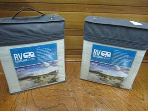 lot 103 image: (2) SETS RV COLLECTION SATEEN NARROW KING SHEET SETS APPEAR NIB. ONE BAG HAS A TEAR WHERE HANDLE IS