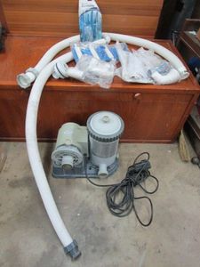 lot 138 image: POOL ACCESSORIES &amp NECESSATIES, ICE CHEST, CONCRETE TOOLS, TILE SAW BLADE, COVER SAVER FOR POOL, LARGE PVC ELBOWS