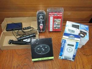 lot 131 image: LED UMBRELLA LIGHT, BRINKS DIGITAL TIMER, (2) TRI LYNX SOLAR DROP IN LIGHT, 7 POST SHORTIES, RABBIT AERATING POURER, NEWER TRIPOD PHOTO LIGHT