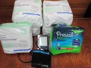 lot 149 image: WALLGREENS PORTABLE BLOOD PRESSUE TEST DEVICE, (1) PREVAIL 14 COUNT ADULT ABSORBANT UNDERWEAR, (5) 14 COUNT ADULT ULTRA ABSORBANT UNDERWEAR, ALL 6 PACKS SIZE XL