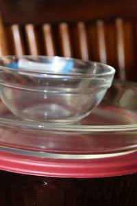 lot 23 image: Purple Pyrex Nesting Bowl Set and Clear Bowls
