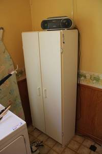 lot 136 image: Storage Cabinet and Sony Portable RadioCD Player