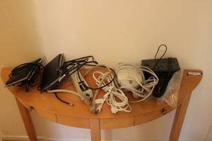 lot 155 image: Electronics Lot Surge Protectors, GE Digital Indoor Antenna, Clock Radio