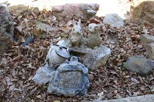 lot 174 image: Small Yard Statues Bunnies, Frog, and Pull Weeds Rock