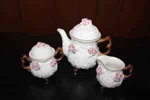 lot 42 image: Tea Set White with Pink Roses Pitcher, Creamer and Sugar Dish