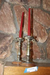 lot 59 image: Pair of Brass Candleholders with Taper Candles
