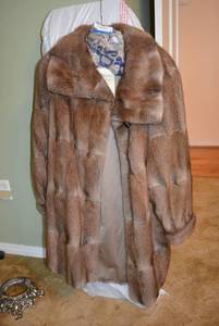 lot 2 image: Muskrat Fur Coat with Original Receipt from Koslows