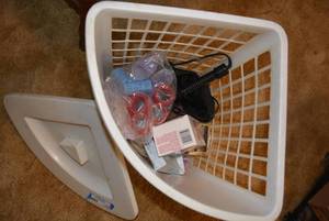 lot 102 image: Laundry Basket, Loreal Hair Color, Curling Irons and Rollers
